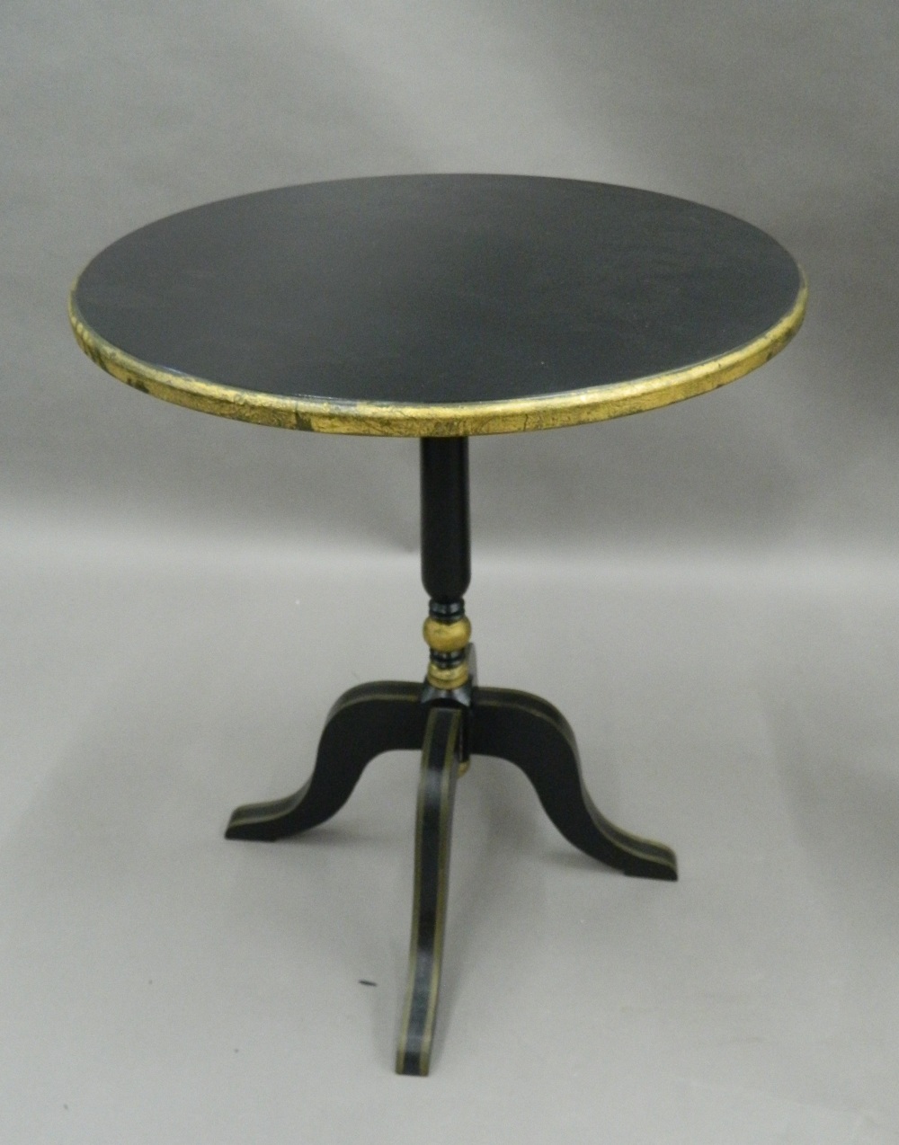 A matched set of three black and gold painted side tables. The largest 72 cm high. - Image 2 of 7