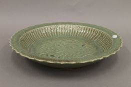 A large Chinese celadon dish. 41.5 cm diameter.