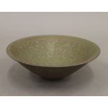 A Chinese crackle glazed green floral bowl. 20 cm wide.