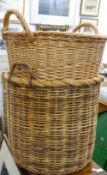 Two large log baskets. The largest 55 cm wide.