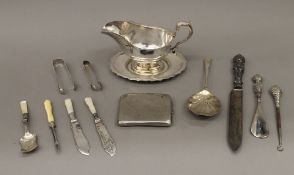 A quantity of silver plate and silver tongs