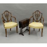 A pair of reproduction open armchairs and a Victorian Sutherland table. The chairs 58 cm wide.