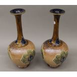 A pair of Art Nouveau Royal Doulton vases. 40 cm high.