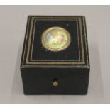 A 19th century French pocket watch holder, the lid set with a miniature. 8.5 cm long.