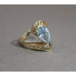 A 14 K gold aquamarine ring. Ring Size P.