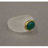 A crystal gold and jade ring. Ring size M/N.