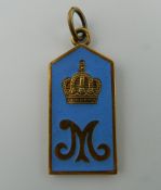 An enamel silver gilt pendant, bearing Russian marks. 4 cm high.