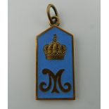 An enamel silver gilt pendant, bearing Russian marks. 4 cm high.