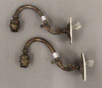 A pair of wall lights. 19 cm long.