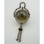 A miniature ball watch. 3.5 cm wide.