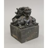 A Chinese bronze seal. 12 cm high.