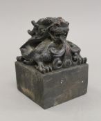 A Chinese bronze seal. 12 cm high.