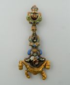 An early 19th century unmarked gold and enamel pendant. 6 cm high. 4 grammes total weight.