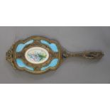 A French Palais-Royal hand mirror set with a miniature painting. 28 cm high.