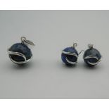 A pair of silver lapis earrings, together with matching pendant. The latter 3 cm high.