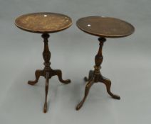 Two mahogany side tables. Each 64 cm high.