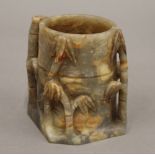 A Chinese jade bamboo style brush pot. 9.5 cm high.