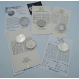 A quantity of silver proof coins, etc.