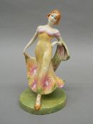 A Peggy Davis figurine,