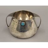 A Liberty & Co Cymric silver twin handled bowl. 7 cm high. 6.3 troy ounces total weight.