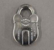 A vesta formed as a padlock. 5.5 cm high.