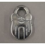 A vesta formed as a padlock. 5.5 cm high.