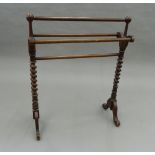 A Victorian mahogany barley twist towel rail. 70.5 cm wide.