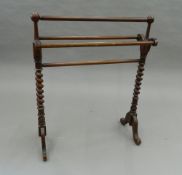 A Victorian mahogany barley twist towel rail. 70.5 cm wide.