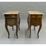 A pair of French 19th century marble topped pot cupboards. Each 74 cm high x 55 cm deep.