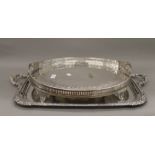 Two silver plated trays. The largest 72 cm wide.