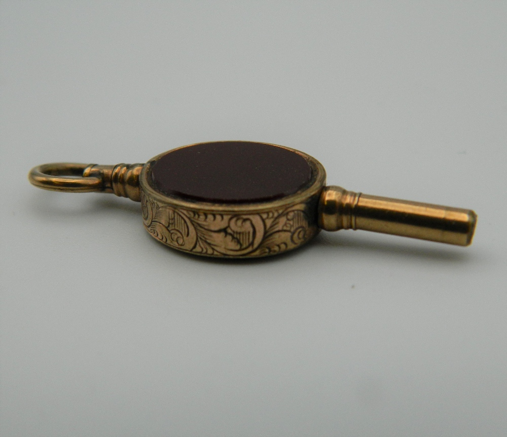 A Victorian carnelian set watch fob key and another. The former 4 cm high. - Image 3 of 3