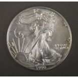 An one ounce solid silver dollar