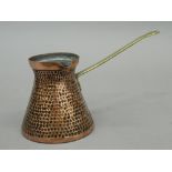 An early 19th century Dinanderie copper chocolate warmer,