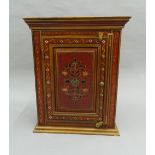 An Indian painted wall cabinet. 51.5 cm wide, 64 cm high, 25.5 cm deep.