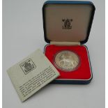 A silver proof crown