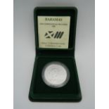 A 1986 10 dollar Bahamas silver coin