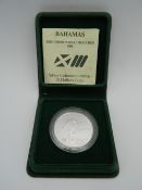 A 1986 10 dollar Bahamas silver coin