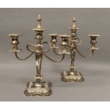 A pair of silver plated candelabra. 36 cm high.