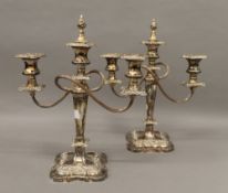 A pair of silver plated candelabra. 36 cm high.