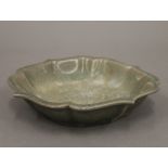 A Chinese celadon bowl. 18.