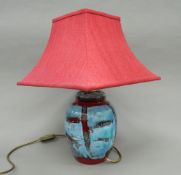 A Poole pottery lamp. 50 cm high overall.