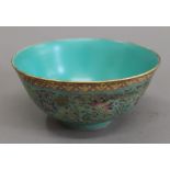 A Chinese turquoise ground porcelain bowl. 16.5 cm diameter.