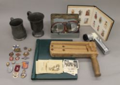 A quantity of miscellaneous items, including tankards, binoculars, etc.