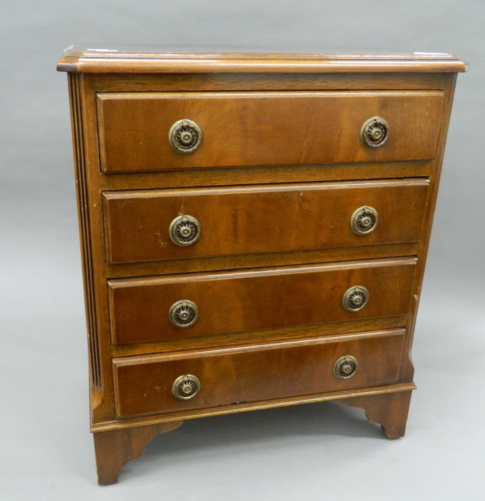 A small modern chest of drawers. 52 cm wide.