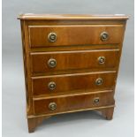 A small modern chest of drawers. 52 cm wide.