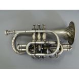 A silver plated cornet. 32 cm long.