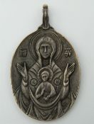 An icon formed pendant, bearing Russian marks. 5 cm high.