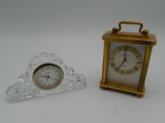 Two miniature clocks. The largest 8.5 cm high.