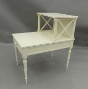 A white painted telephone table. 46 cm wide.