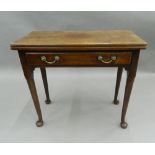 A George III mahogany pad foot tea table. 81 cm wide.